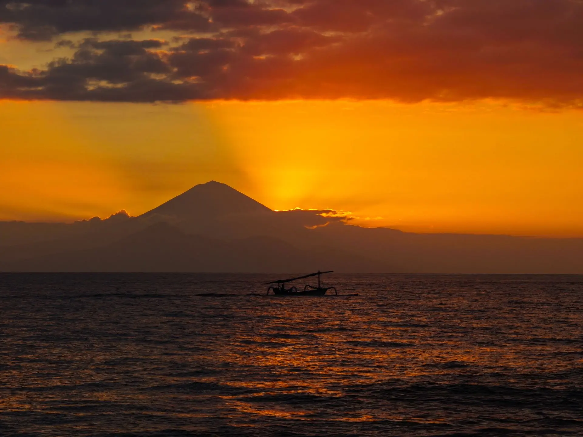 Sunset behind the Gunung Api volcano, Banda Sea.